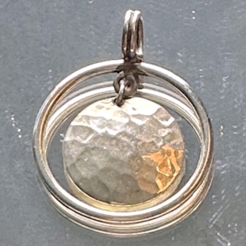 Silver Tone Hammered Disk Floating Inside a Circle Pendant
